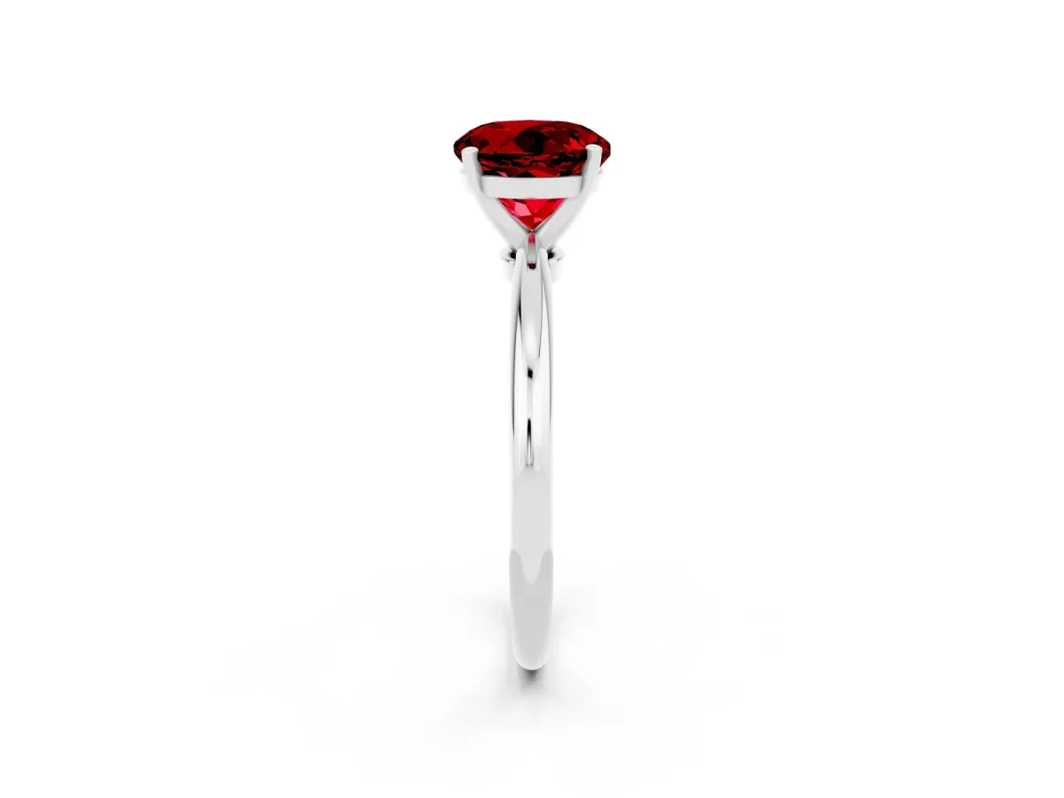 Round Cut Ruby Solitaire Ring with Six-Prong Setting and Classic Band Platinum