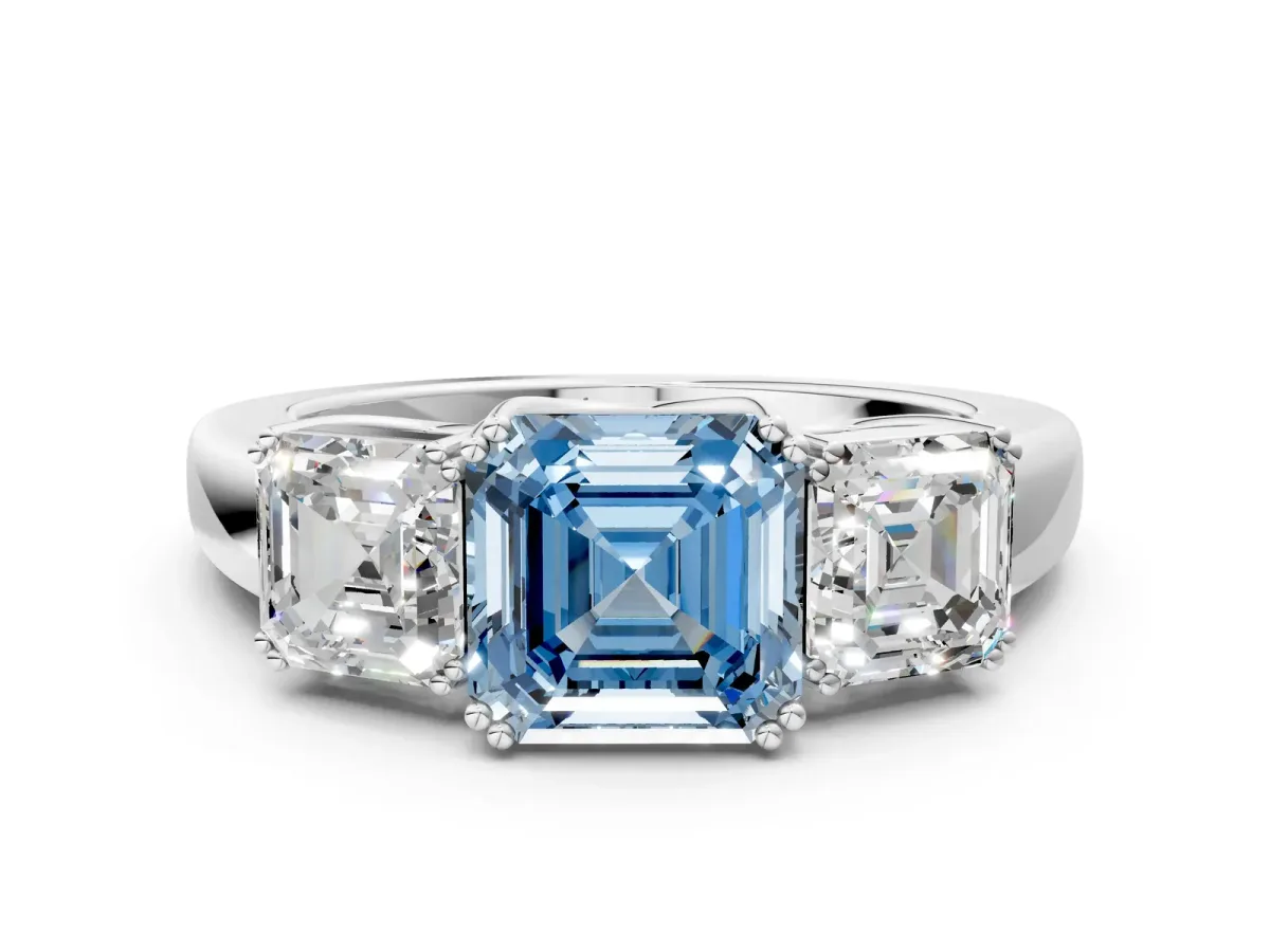 Fancy Blue Three-Stone Asscher Cut Cut Diamond Ring with Channel Set Band and Four-Prong Setting Silver