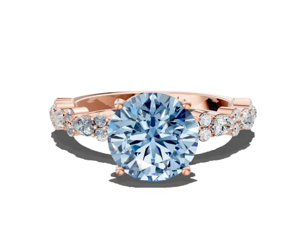 Fancy Blue Round Cut Diamond Side Stone Solitaire Ring with Round and Four-Prong Setting Rose gold