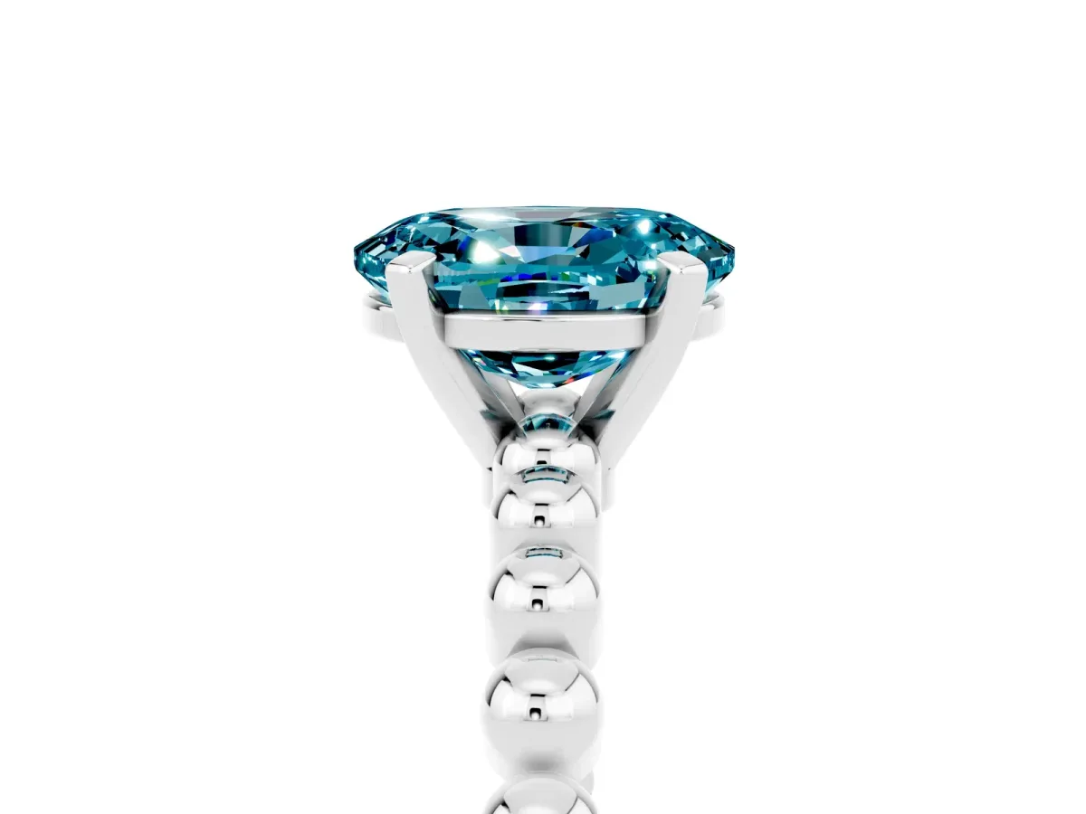 Oval Cut Blue Topaz Solitaire Ring with Beaded Band and Prong Setting Silver