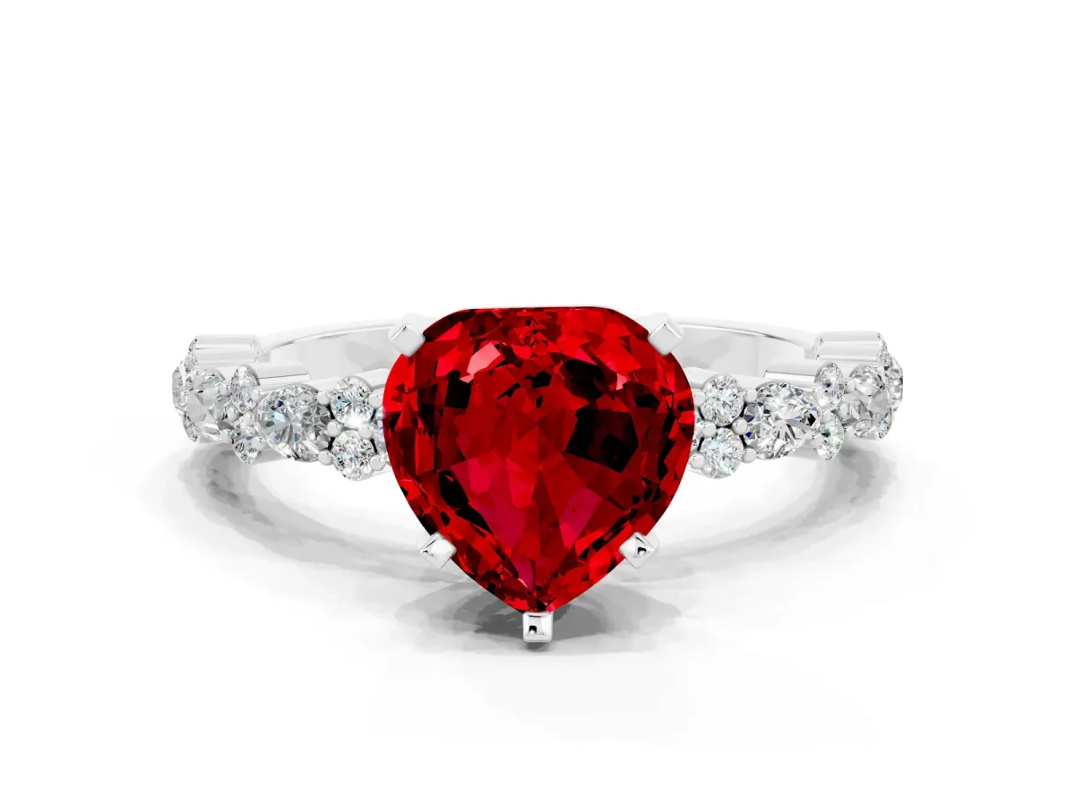 Heart Cut Ruby Side Stone Solitaire Ring with Round and Four-Prong Setting Silver