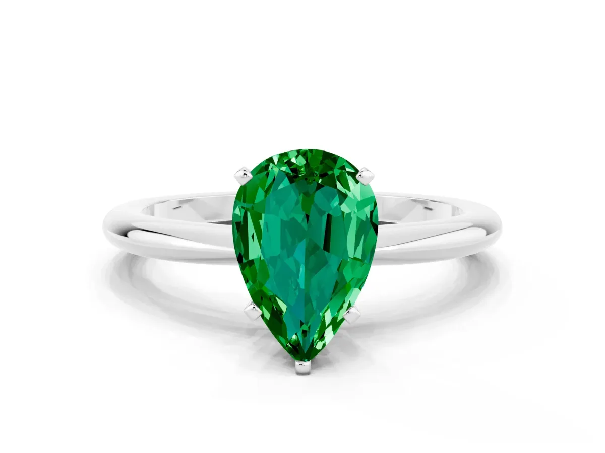 Pear Cut Emerald Solitaire Ring with Six-Prong Setting and Classic Band Silver