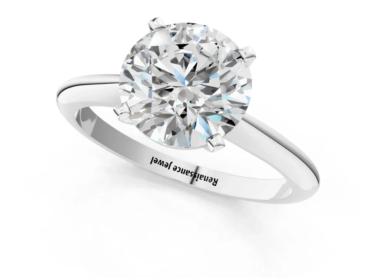 Round Cut Diamond Solitaire Engagement Ring with Classic Band and Four-Prong Setting Silver