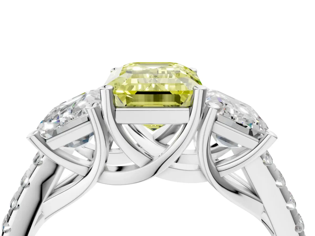 Fancy Yellow Three-Stone Emerald Cut Diamond Ring with Round Pavé Band and Prong Setting Silver