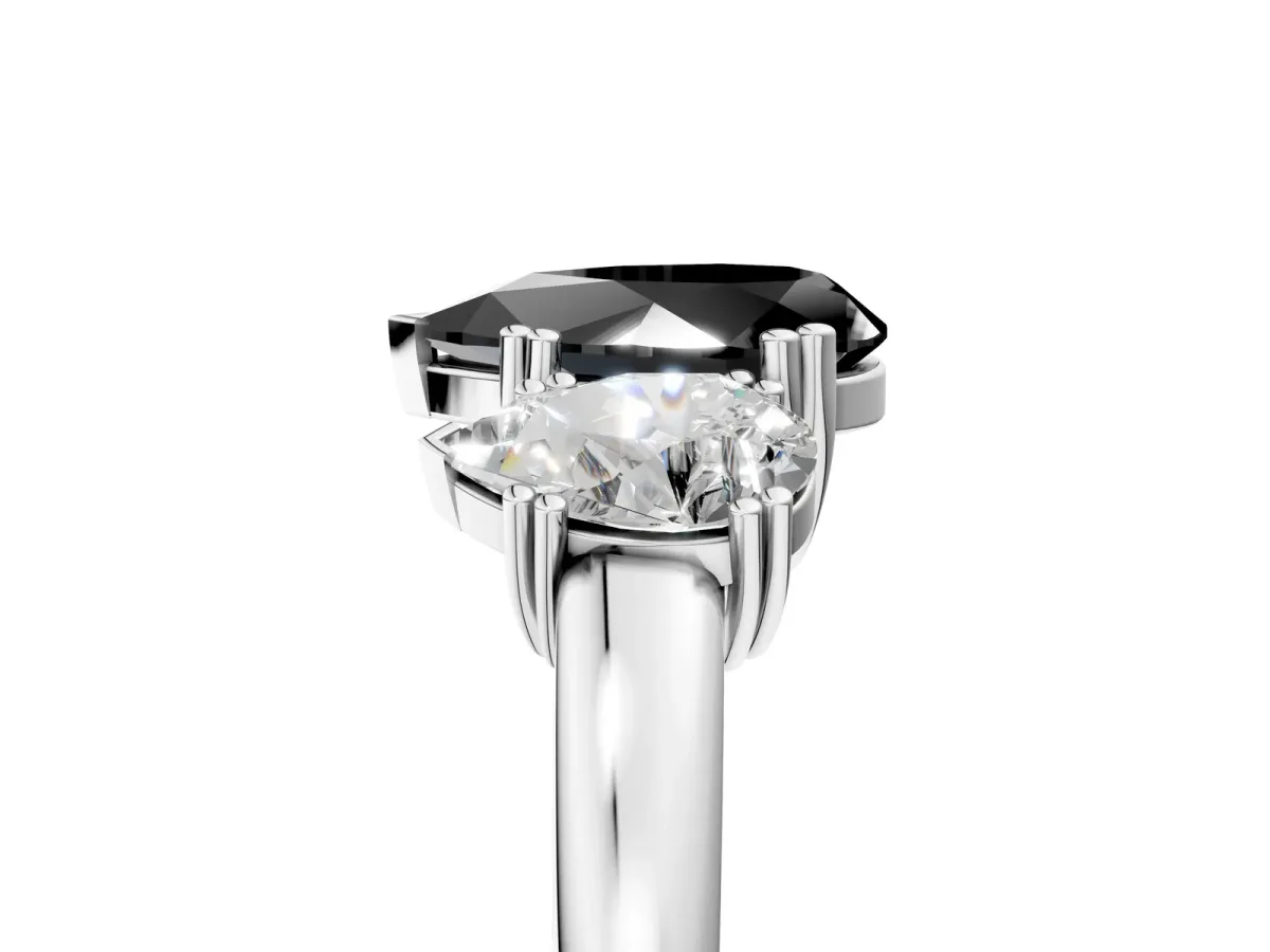 Fancy Black Three-Stone Pear Cut Cut Diamond Ring with Channel Set Band and Four-Prong Setting Silver