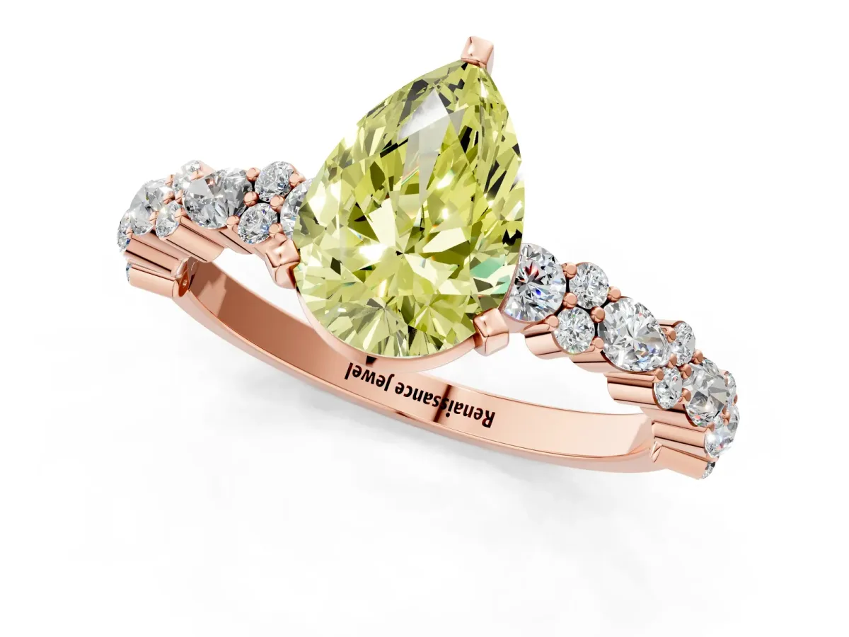 Fancy Yellow Pear Cut Diamond Side Stone Solitaire Ring with Round and Four-Prong Setting Rose gold