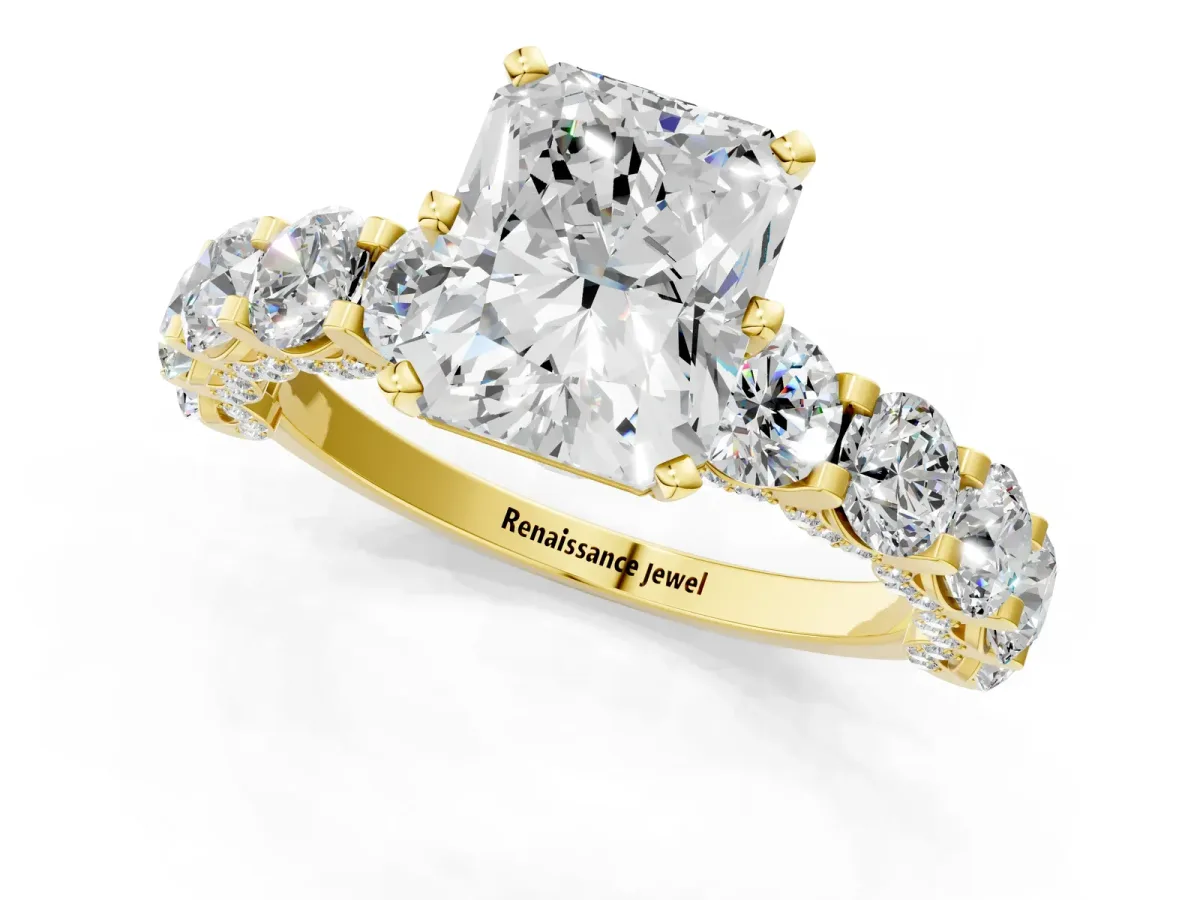 Radiant Cut Diamond Side Stone Engagement Ring with Four-Prong Setting Yellow gold