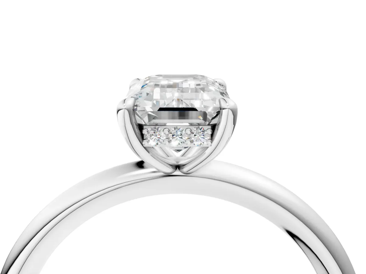 Emerald Cut Diamond Solitaire Ring with Thin Band and Four-Prong Setting White gold