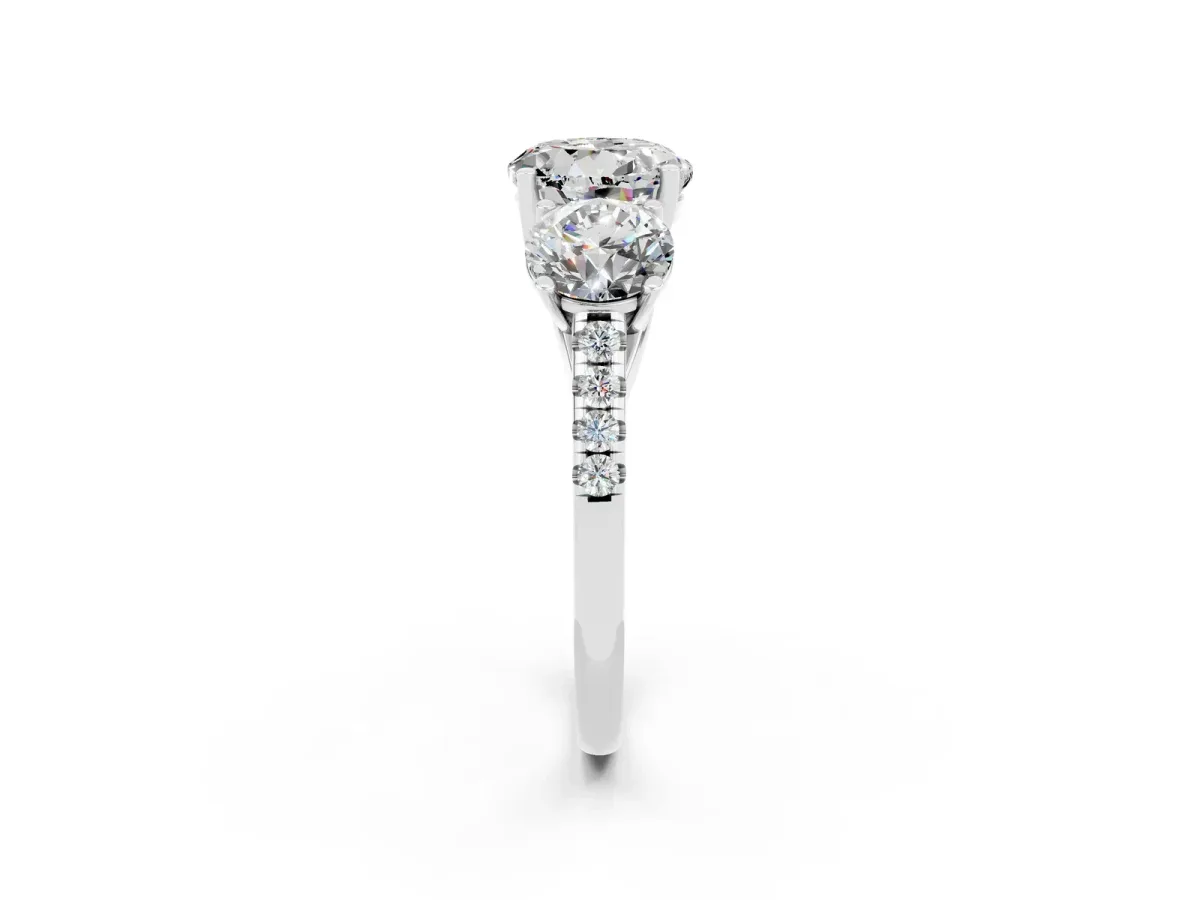Three-Stone Round Cut Moissanite Ring with Round Pavé Band and Prong Setting Platinum