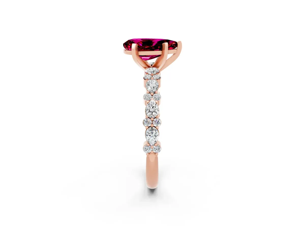 Pear Cut Garnet Side Stone Solitaire Ring with Round and Four-Prong Setting Rose gold