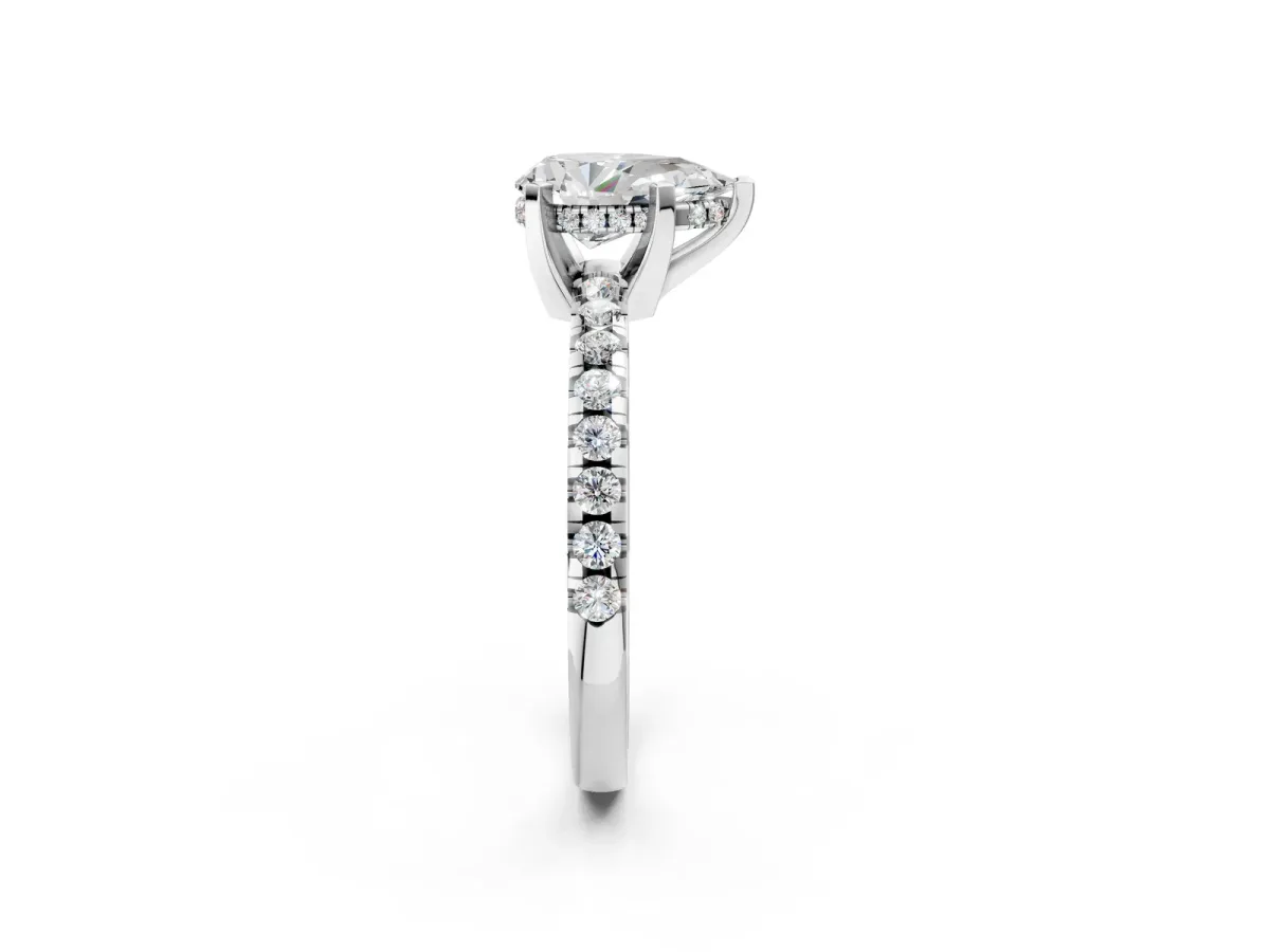 Pear Cut Diamond Solitaire Ring with Round Pavé Band and Four-Prong Setting Platinum