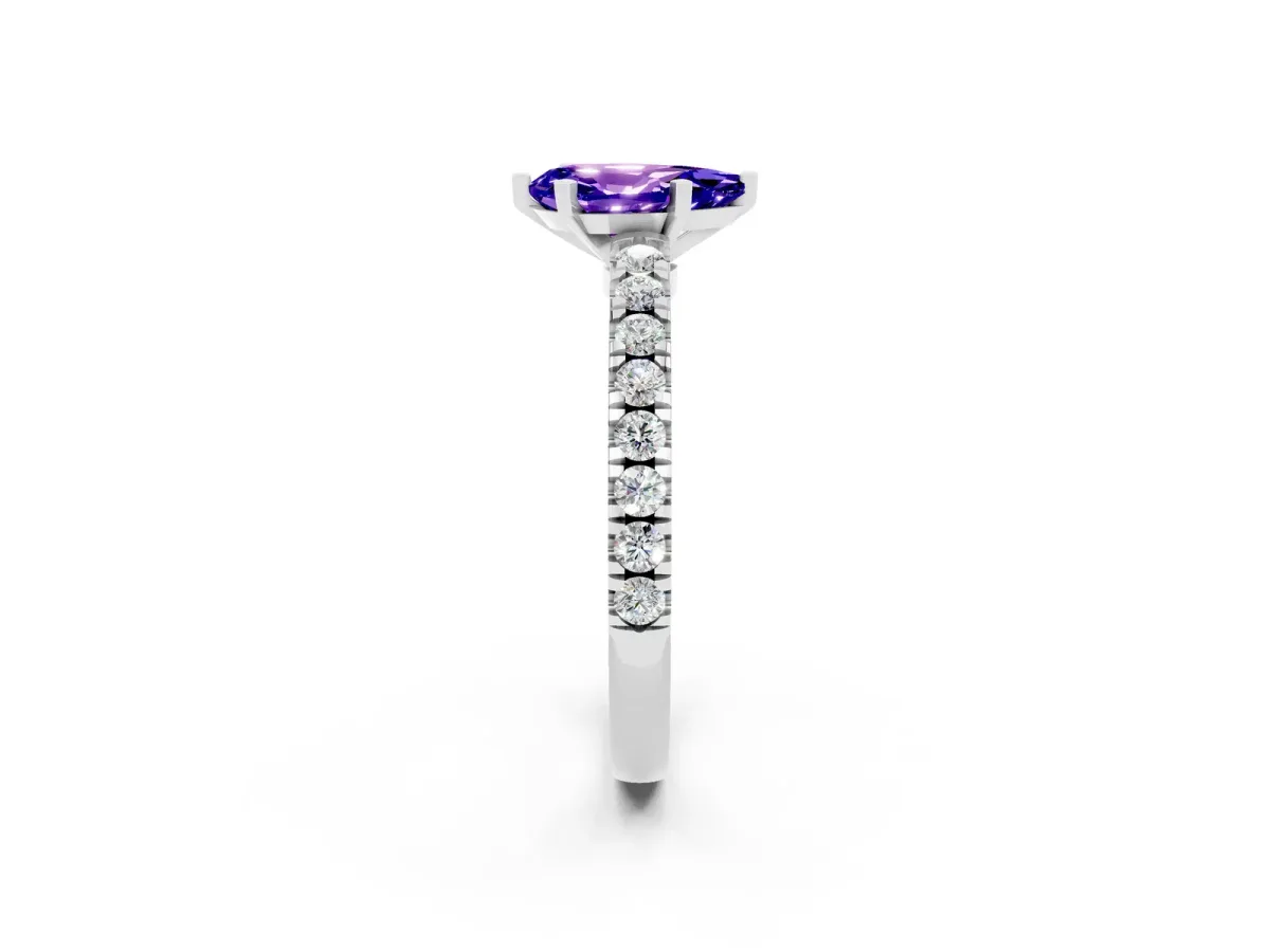 Pear Cut Solitaire Tanzanite with Pavé Band and Four-Prong Setting Silver
