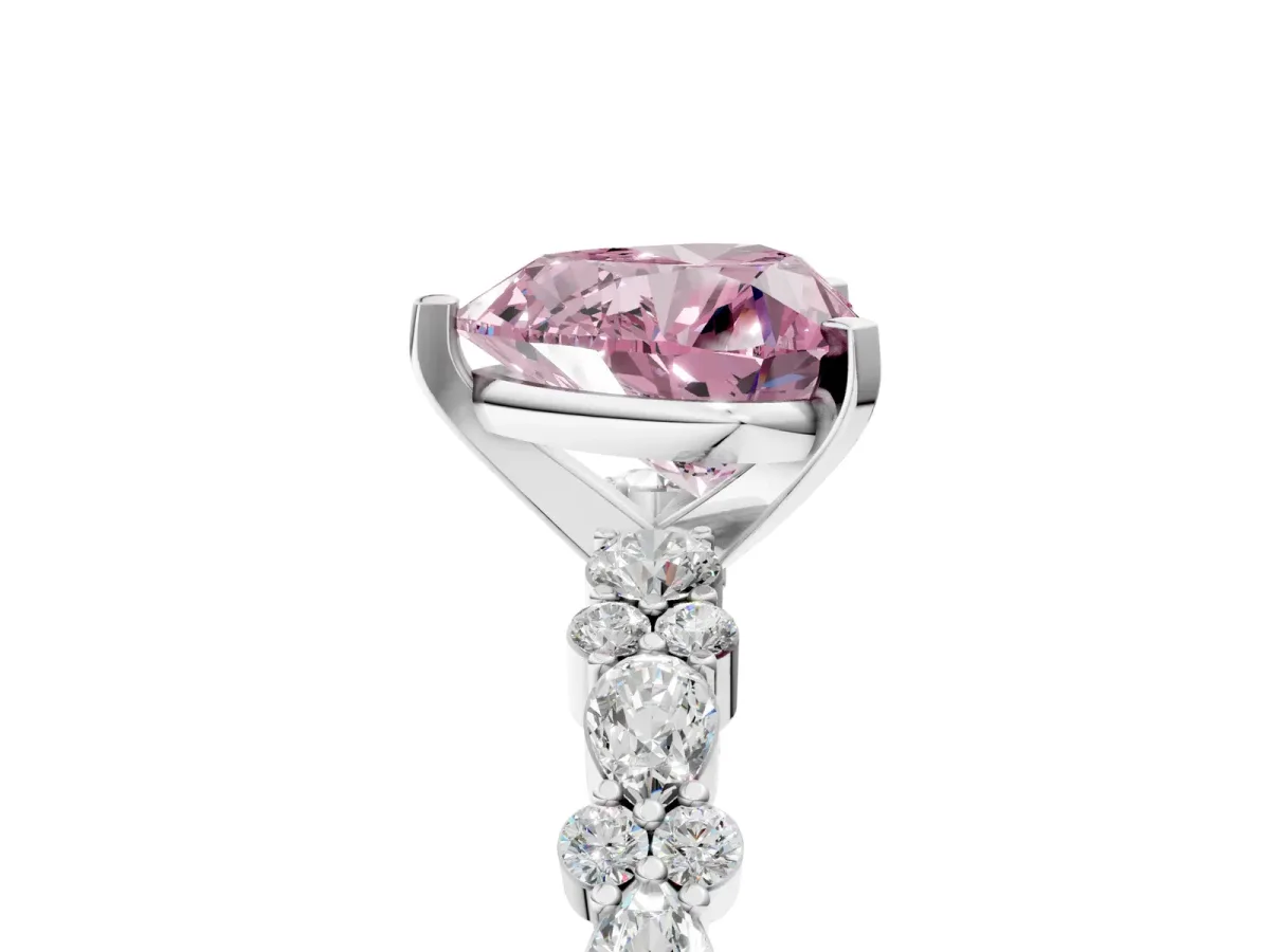 Fancy Pink Heart Cut Diamond Side Stone Solitaire Ring with Round and Four-Prong Setting Platinum