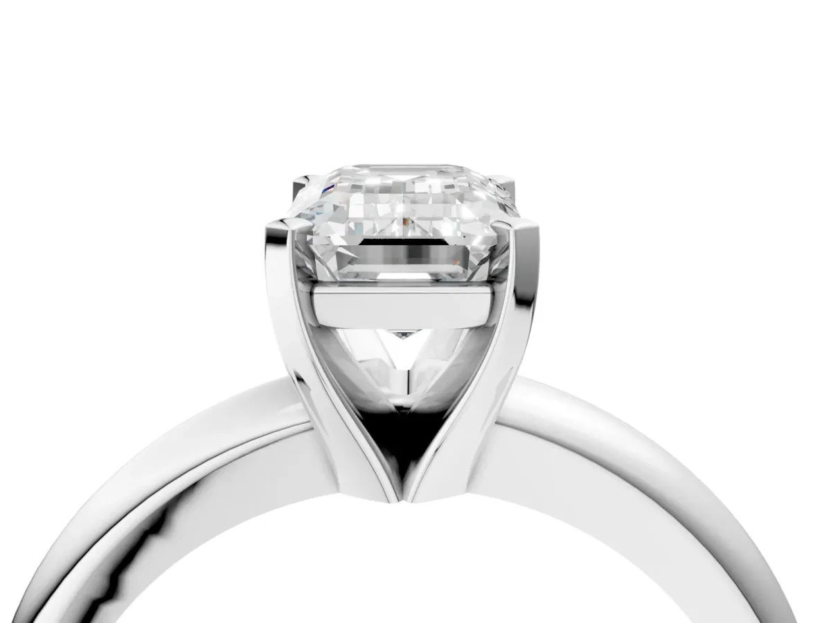 Emerald Cut Diamond Solitaire Engagement Ring with Round Band and Four-Prong Setting Silver