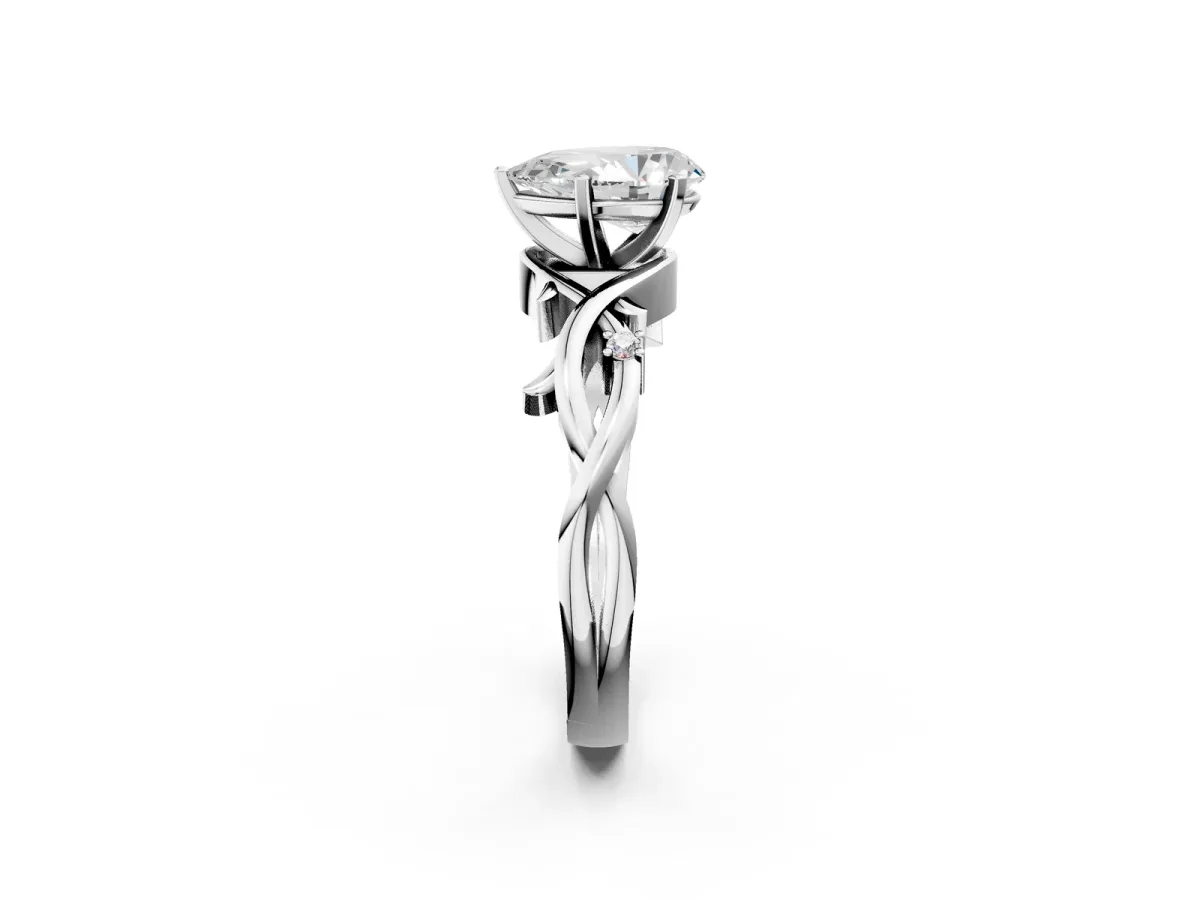 Pear Cut Diamond Solitaire Ring with Twisted Band and Prong Setting Silver