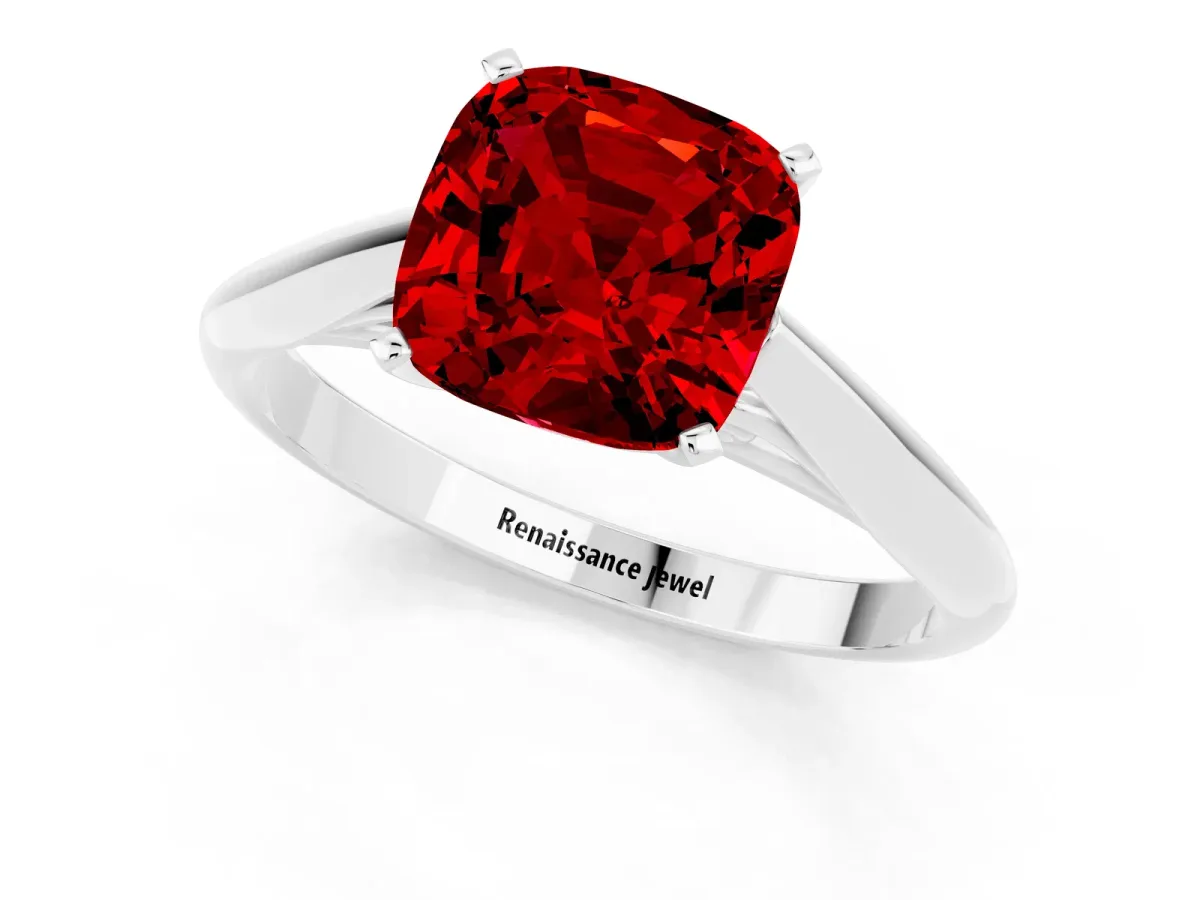 Cushion Cut Ruby Solitaire Engagement Ring with Cathedral Setting and Four-Prong Mount White gold