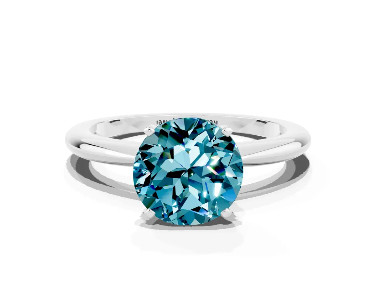 Round Cut Blue Topaz Solitaire Ring with Six-Prong Setting and Classic Band Silver