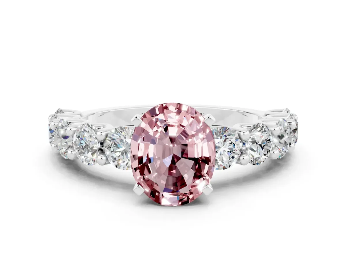 Oval Cut Morganite Prong Setting with Side Stones on a Pave Band Silver