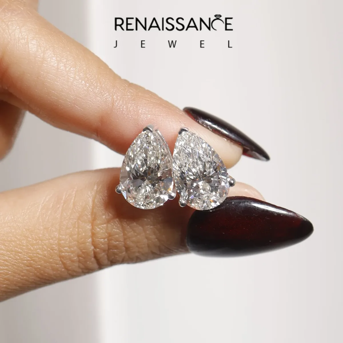 Pear Cut Diamond Stud Earrings Platinum