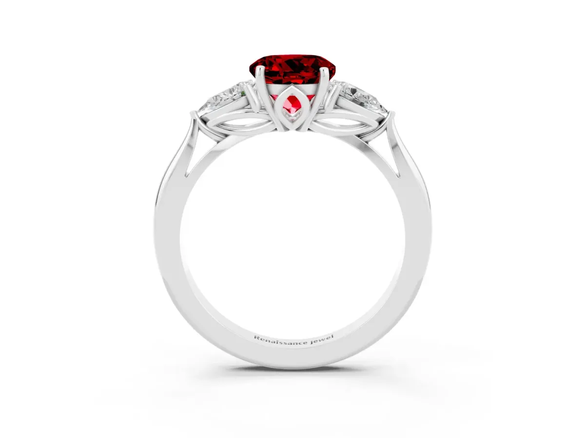 Three-Stone Round Cut Ruby Ring with Pear Side Stones in Four-Prong Setting Platinum