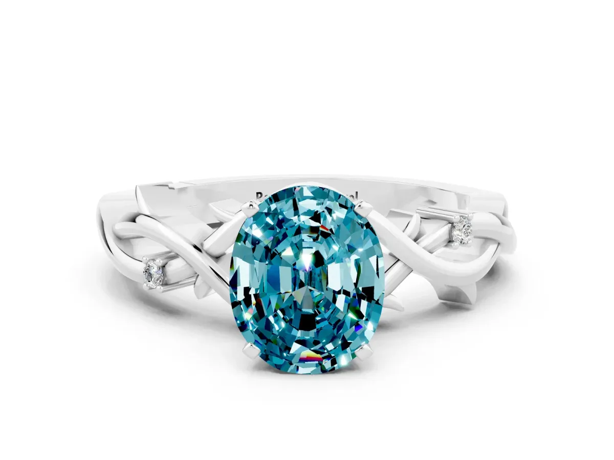 Oval Cut Blue Topaz Solitaire Ring with Twisted Band and Prong Setting Silver
