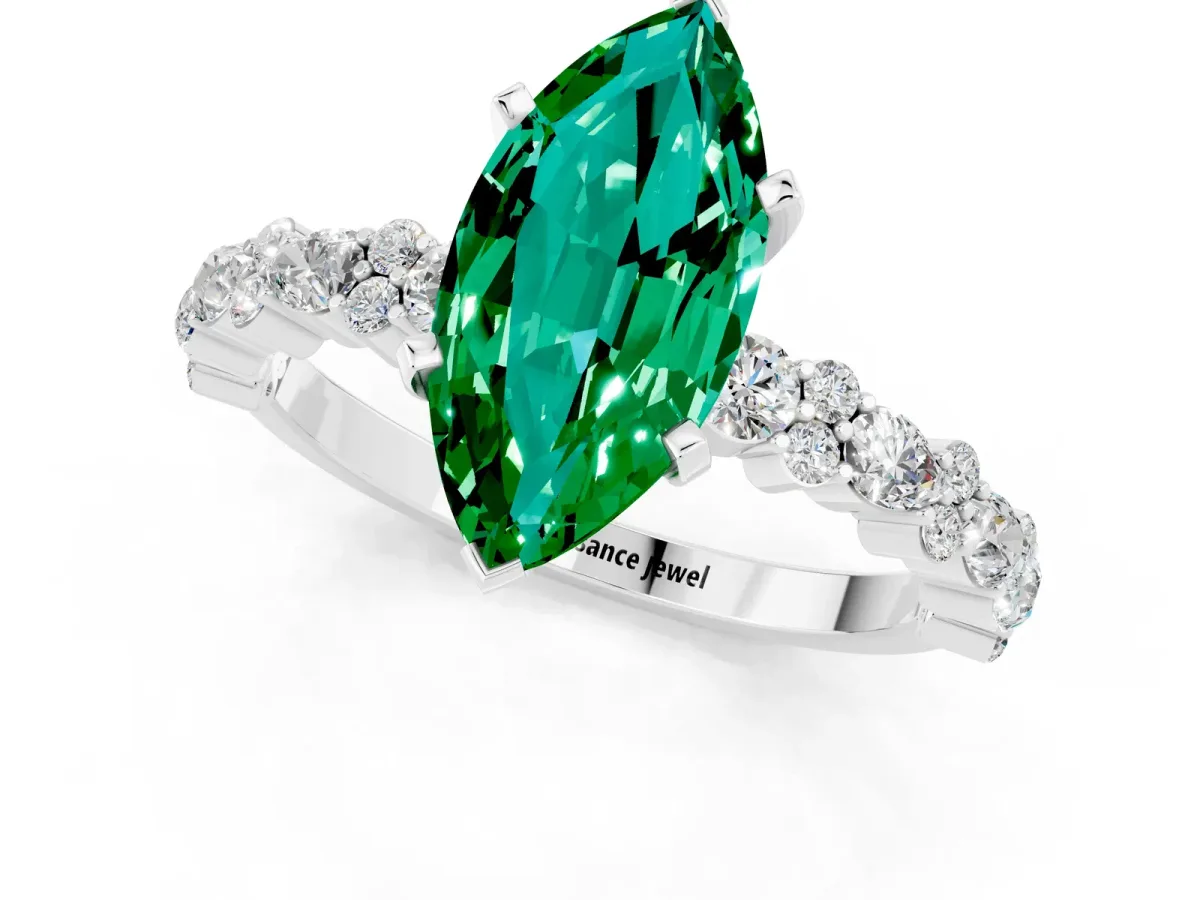 Marquise Cut Emerald Side Stone Solitaire Ring with Round and Four-Prong Setting Platinum