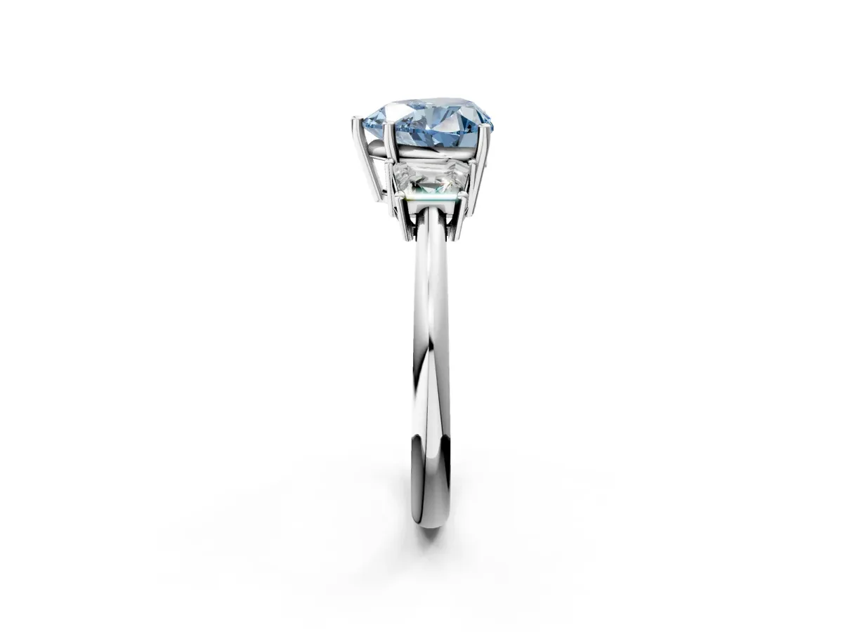 Fancy Blue Heart Cut Diamond Three-Stone Ring with Trapezoid Side Stones and Prong Setting Silver