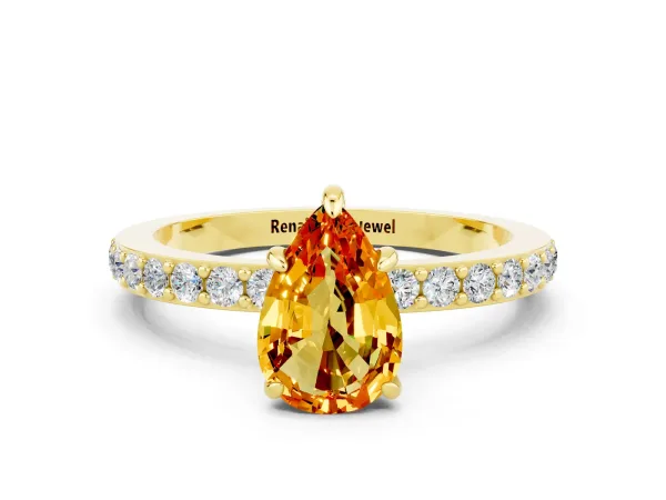 Pear Cut Citrine Solitaire Engagement Ring with Pavé Band and Four-Prong Setting Yellow gold