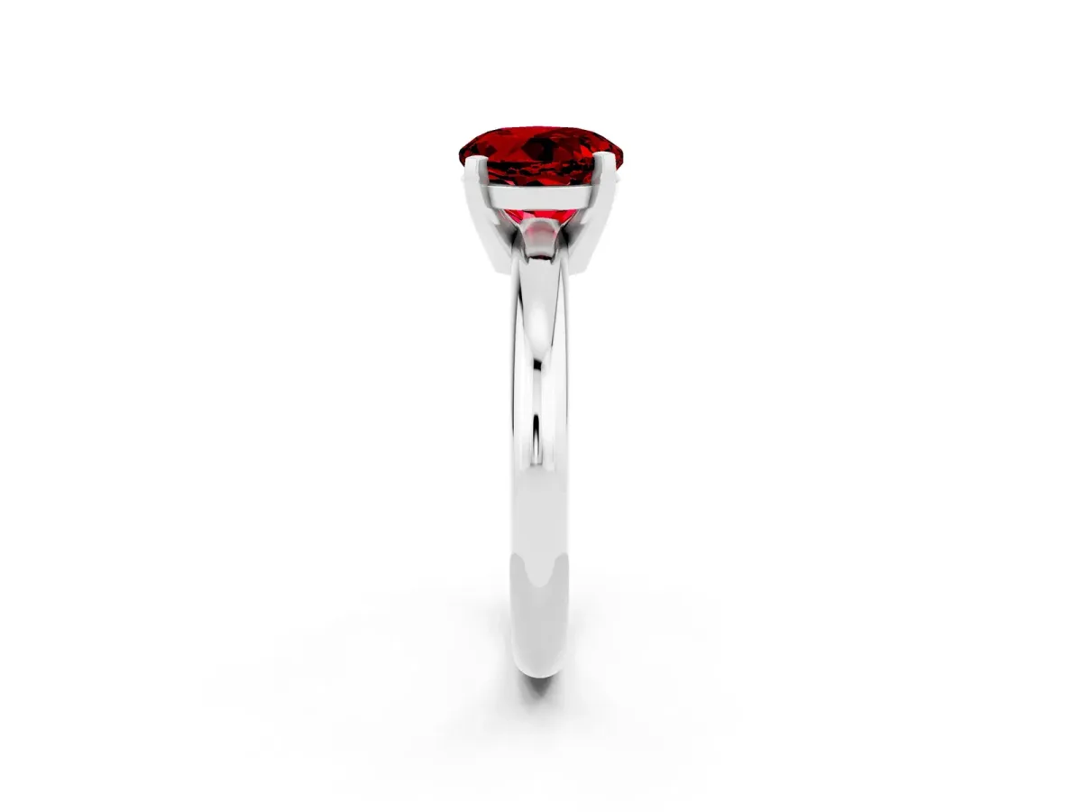 Round Cut Ruby Solitaire Engagement Ring with Round Band and Four-Prong Setting Platinum