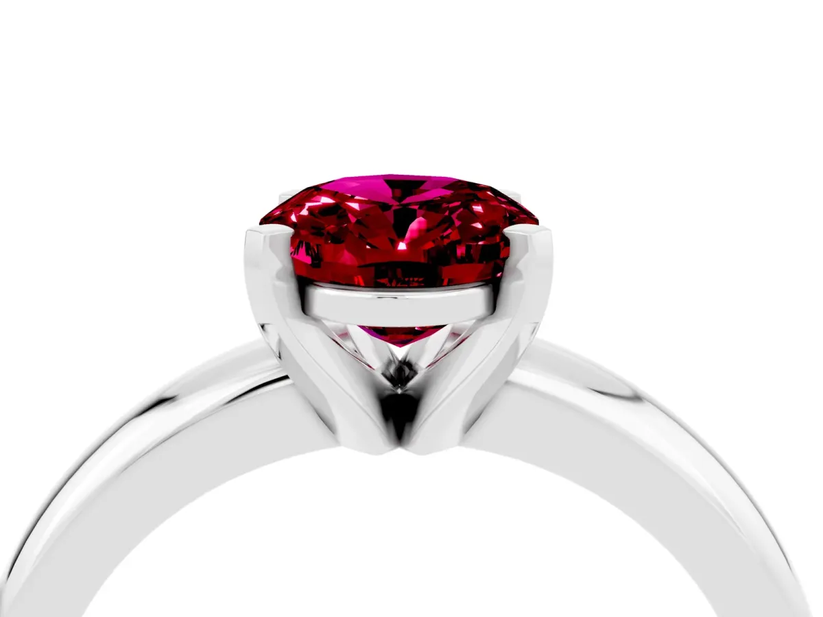 Oval Cut Garnet Solitaire Engagement Ring with Round Band and Four-Prong Setting Silver