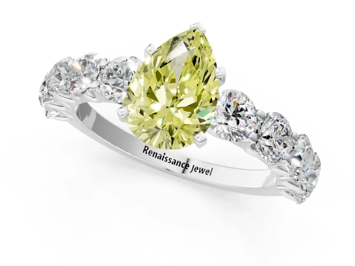 Fancy Yellow Pear Cut Diamond Prong Setting with Side Stones on a Pave Band Silver