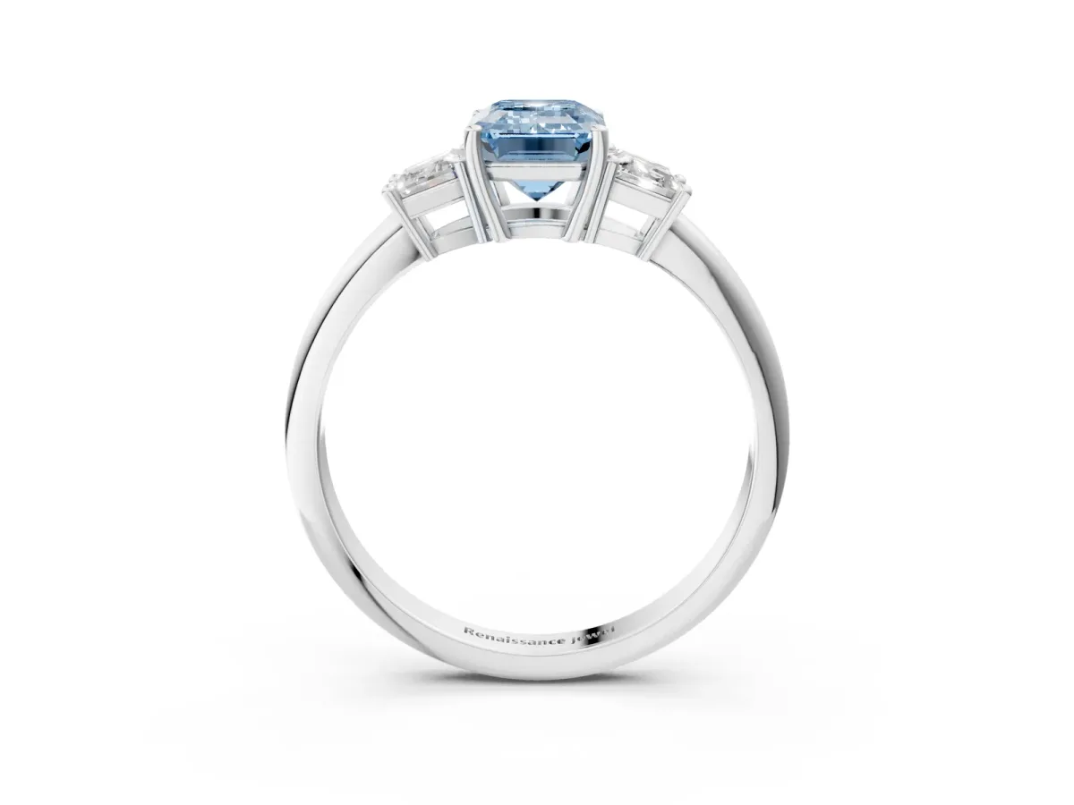 Fancy Blue Emerald Cut Diamond Three-Stone Ring with Trapezoid Side Stones and Prong Setting Silver