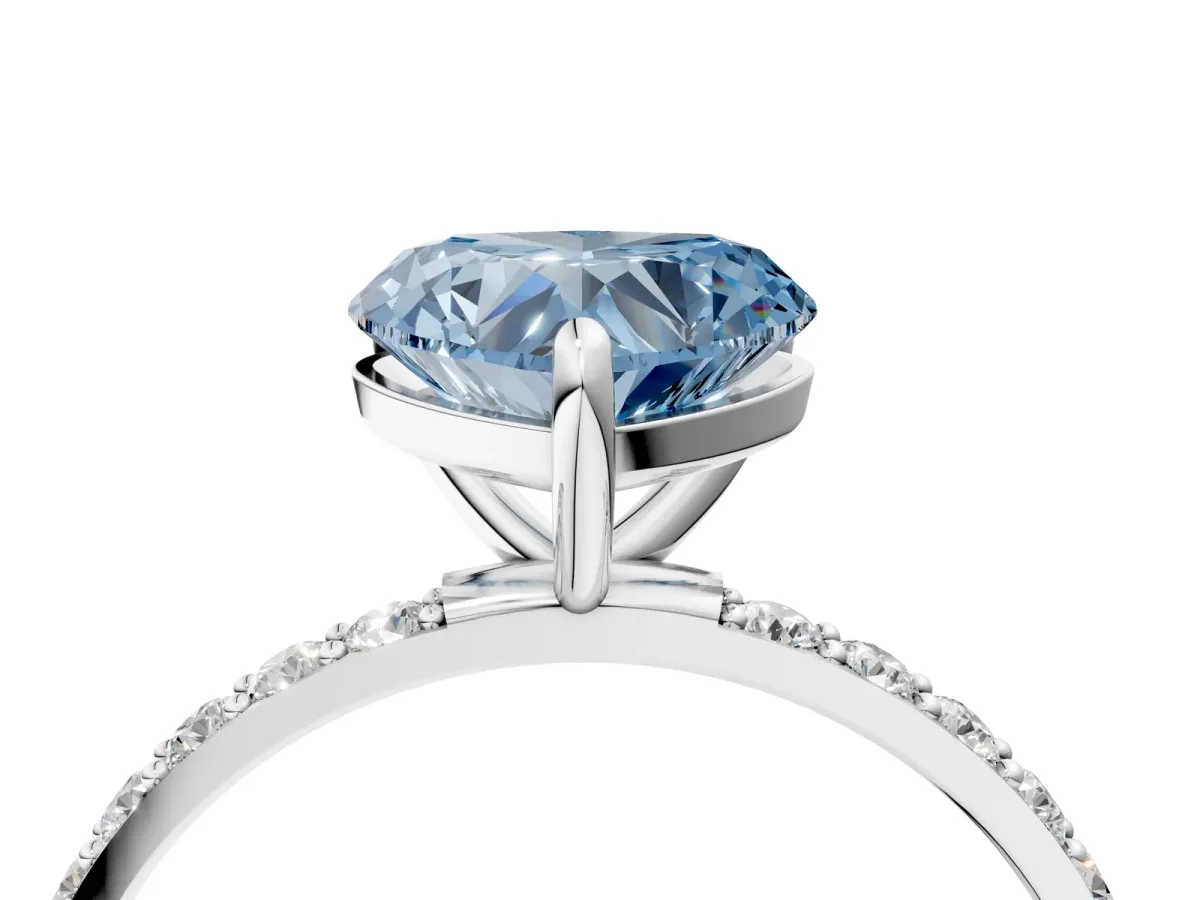 Fancy Blue Heart Cut Diamond Solitaire Ring with Round Pavé Band and Prong Setting Silver