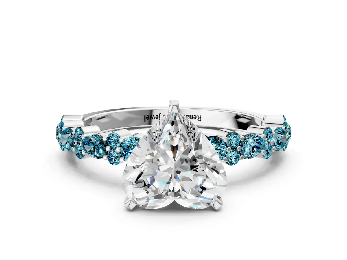 Heart Cut Diamond Side Stone Solitaire Ring with Round Blue Topaz and Four-Prong Setting Silver