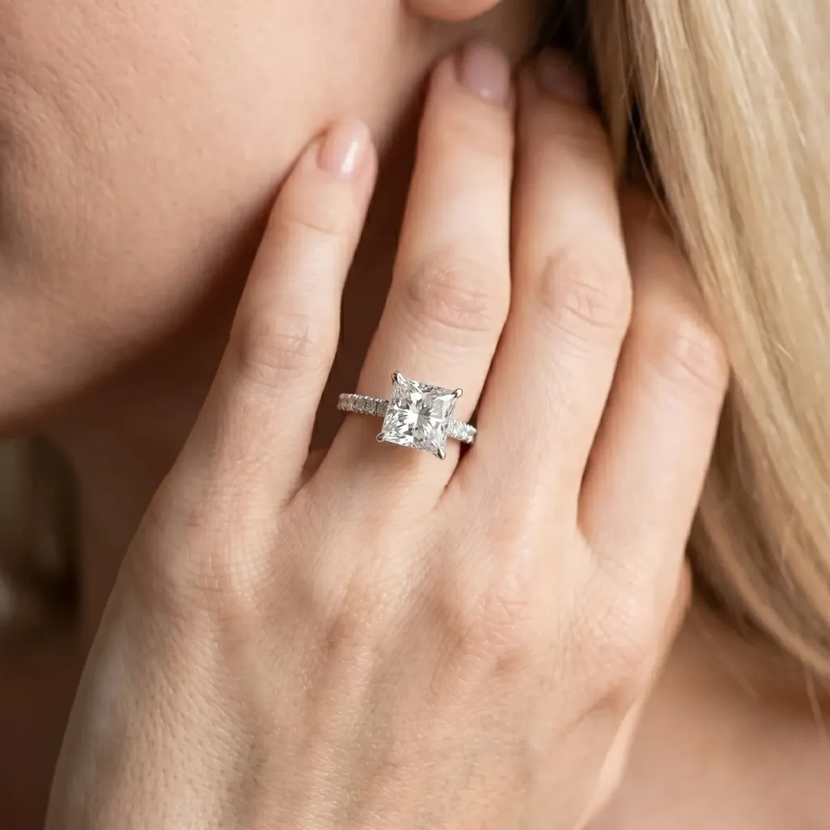 Princess Cut Diamond Solitaire Ring with Round Pavé Band and Four-Prong Setting Silver