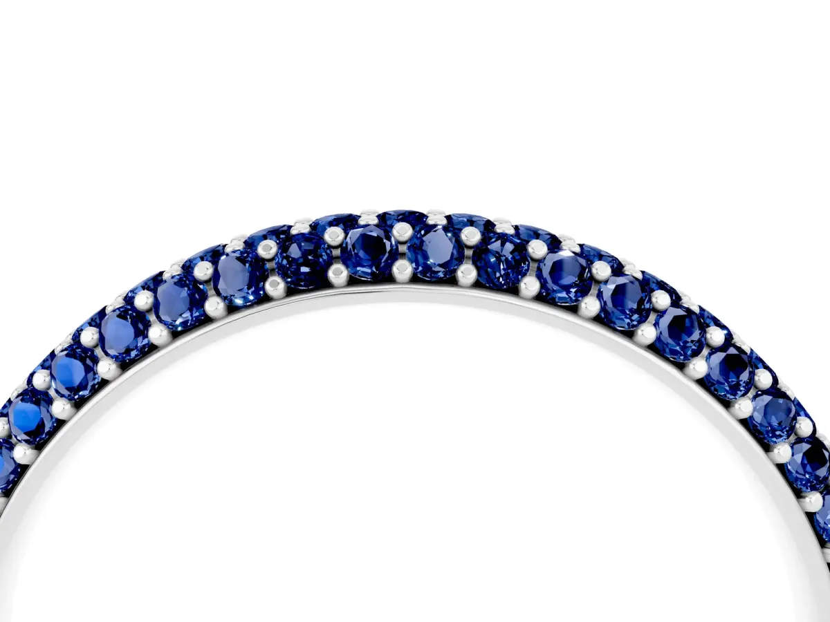 Round Blue Sapphire Pavé Eternity Band with Shared Prong Setting Silver