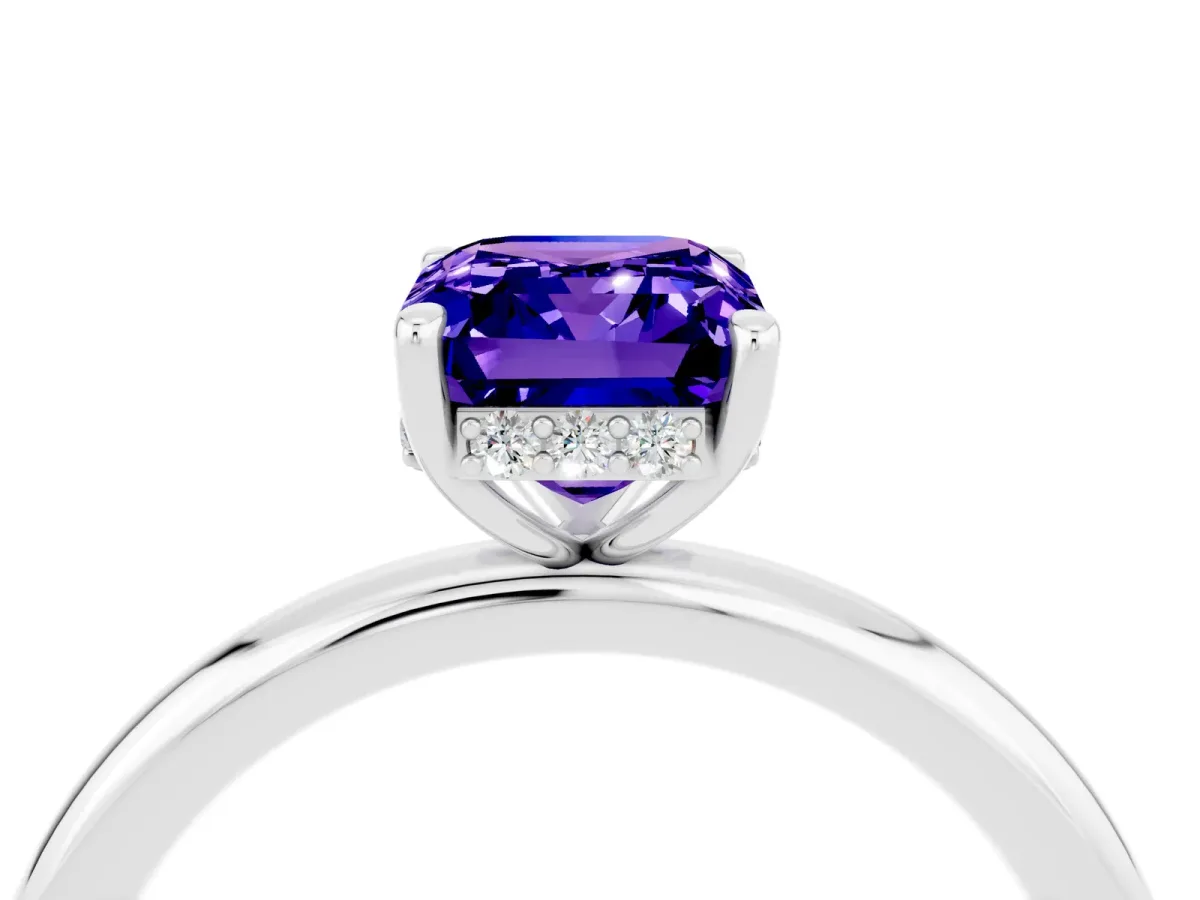 Emerald Cut Tanzanite Solitaire Ring with Thin Band and Four-Prong Setting Platinum