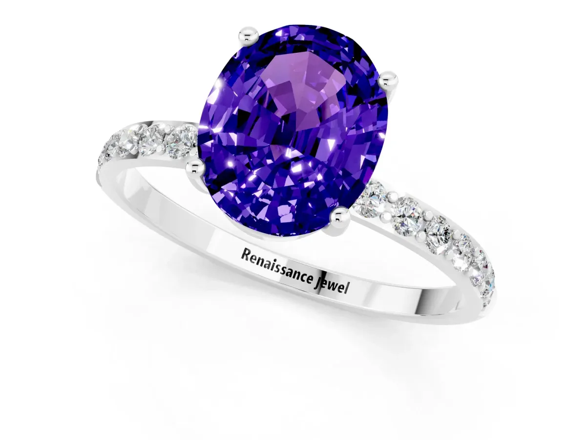 Oval Cut Tanzanite Solitaire Ring with Round Pavé Band and Prong Setting Silver
