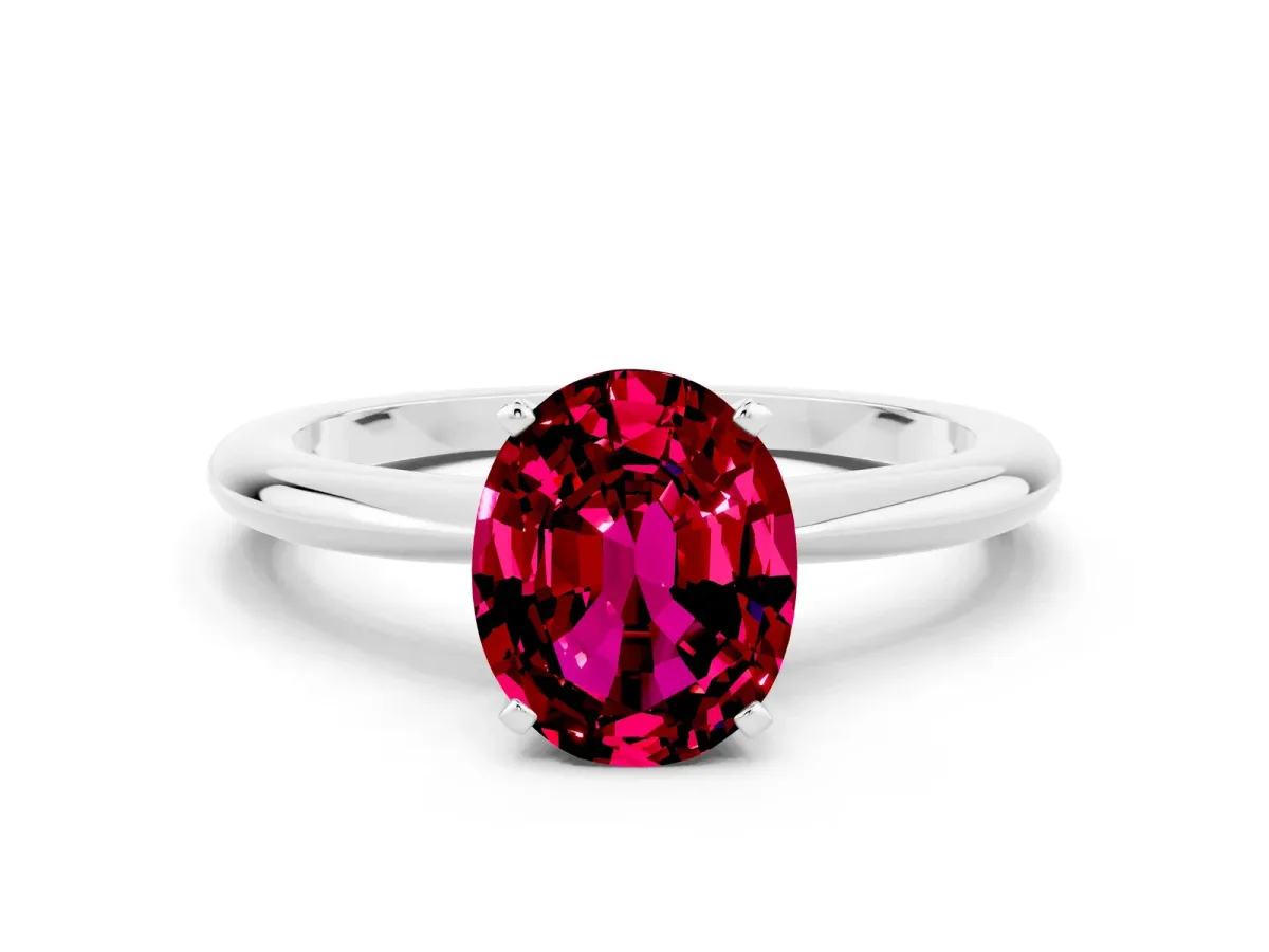 Oval Cut Garnet Solitaire Ring with Six-Prong Setting and Classic Band Silver