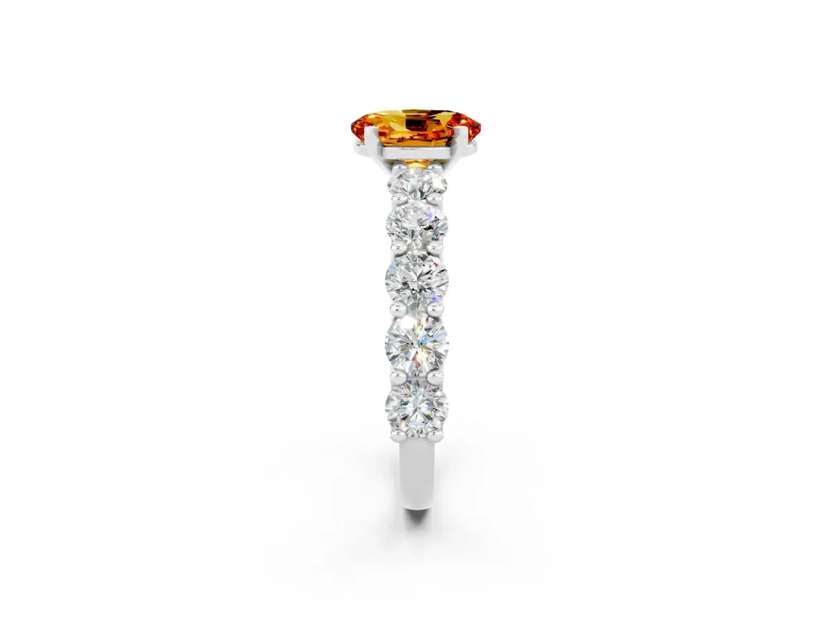 Oval Cut Citrine Prong Setting with Side Stones on a Pave Band Silver