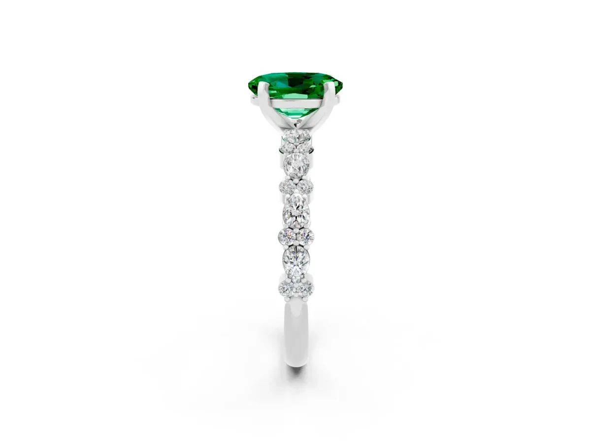 Oval Cut Emerald Side Stone Solitaire Ring with Round and Four-Prong Setting Platinum