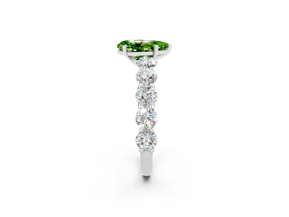 Pear Cut Peridot Prong Setting with Side Stones on a Pave Band White gold