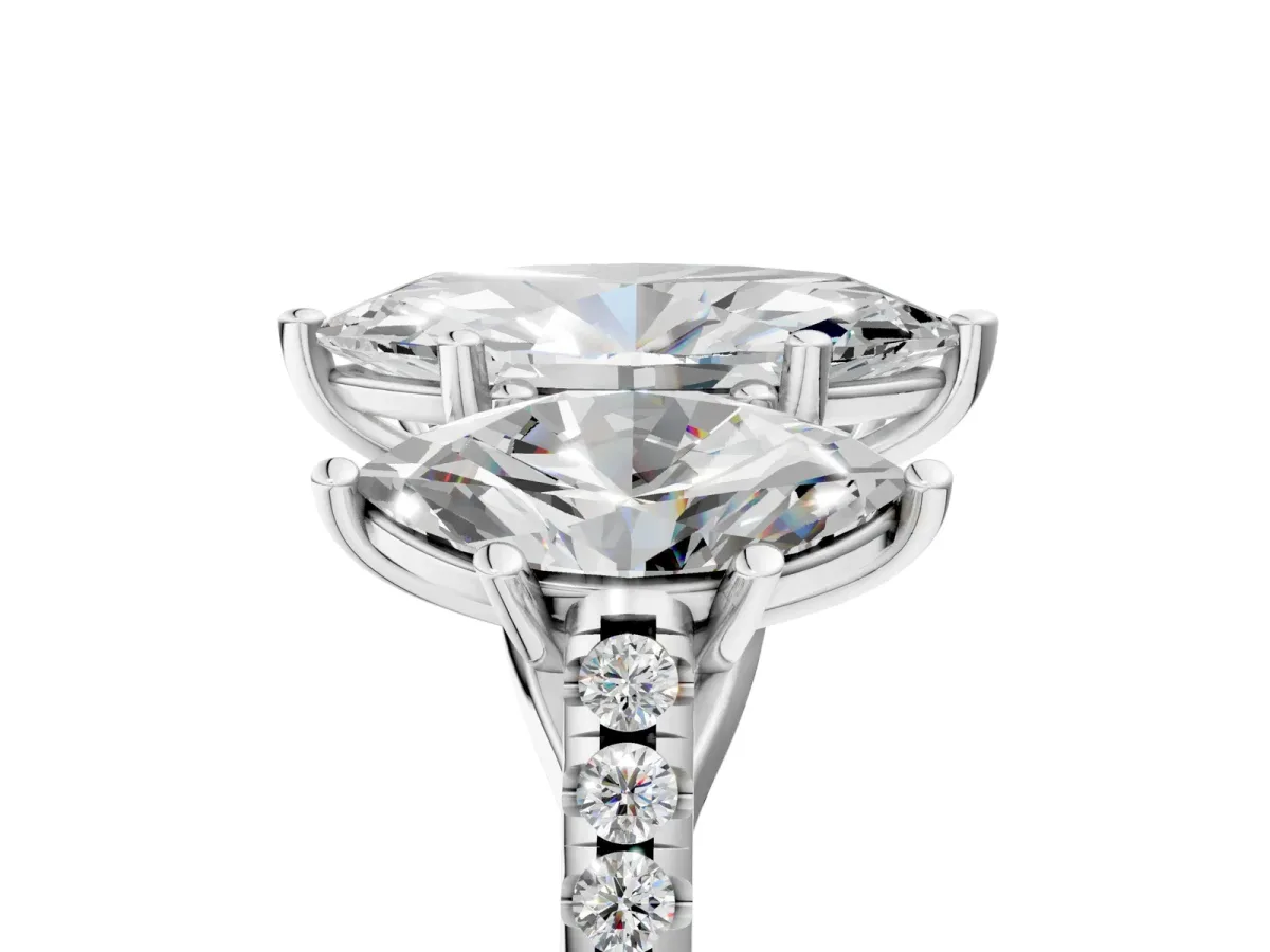 Three-Stone Marquise Cut Diamond Ring with Round Pavé Band and Prong Setting Platinum