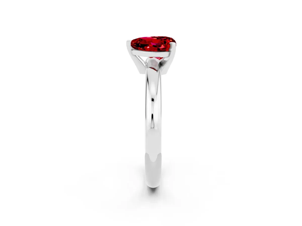 Heart Cut Ruby Solitaire Engagement Ring with Round Band and Four-Prong Setting Silver