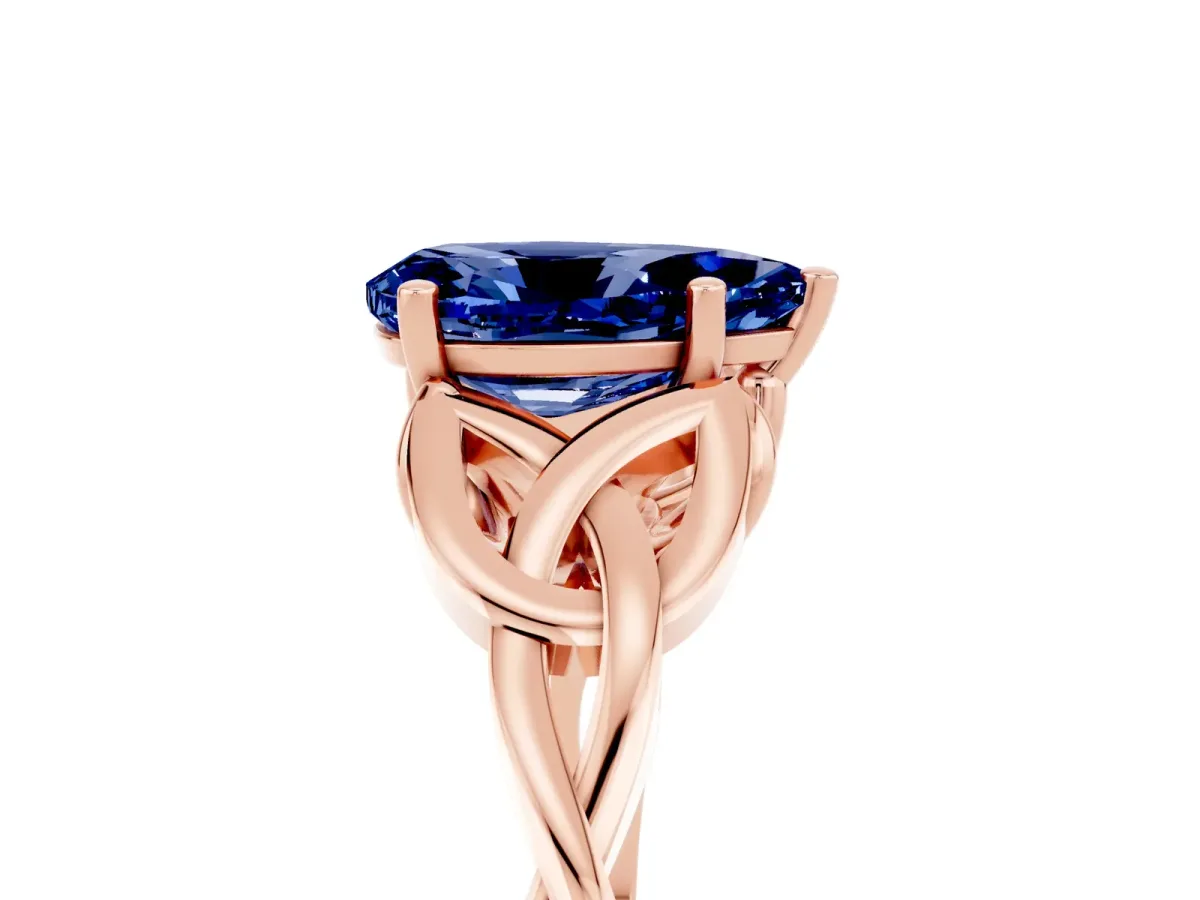 Pear Cut Blue Sapphire Solitaire Celtic Knot Ring with Four-Prong Setting Rose gold