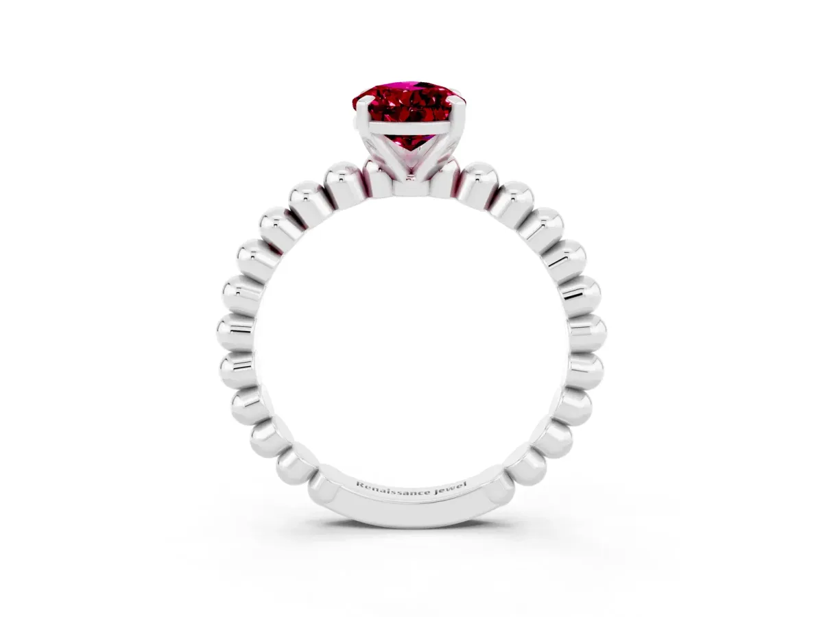 Pear Cut Garnet Solitaire Ring with Beaded Band and Prong Setting Silver