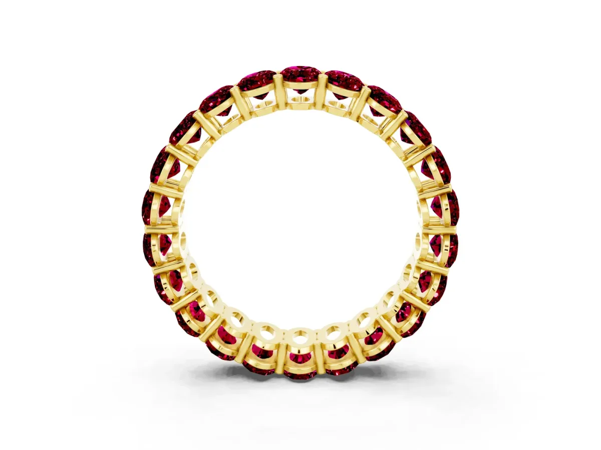 Oval Cut Garnet Eternity Band with Shared Prong Setting Yellow gold