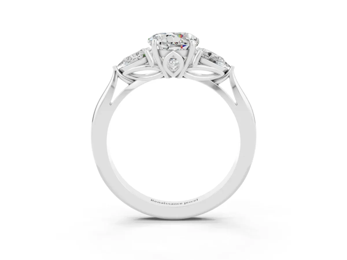 Three-Stone Round Cut Moissanite Ring with Pear Side Stones in Four-Prong Setting Platinum