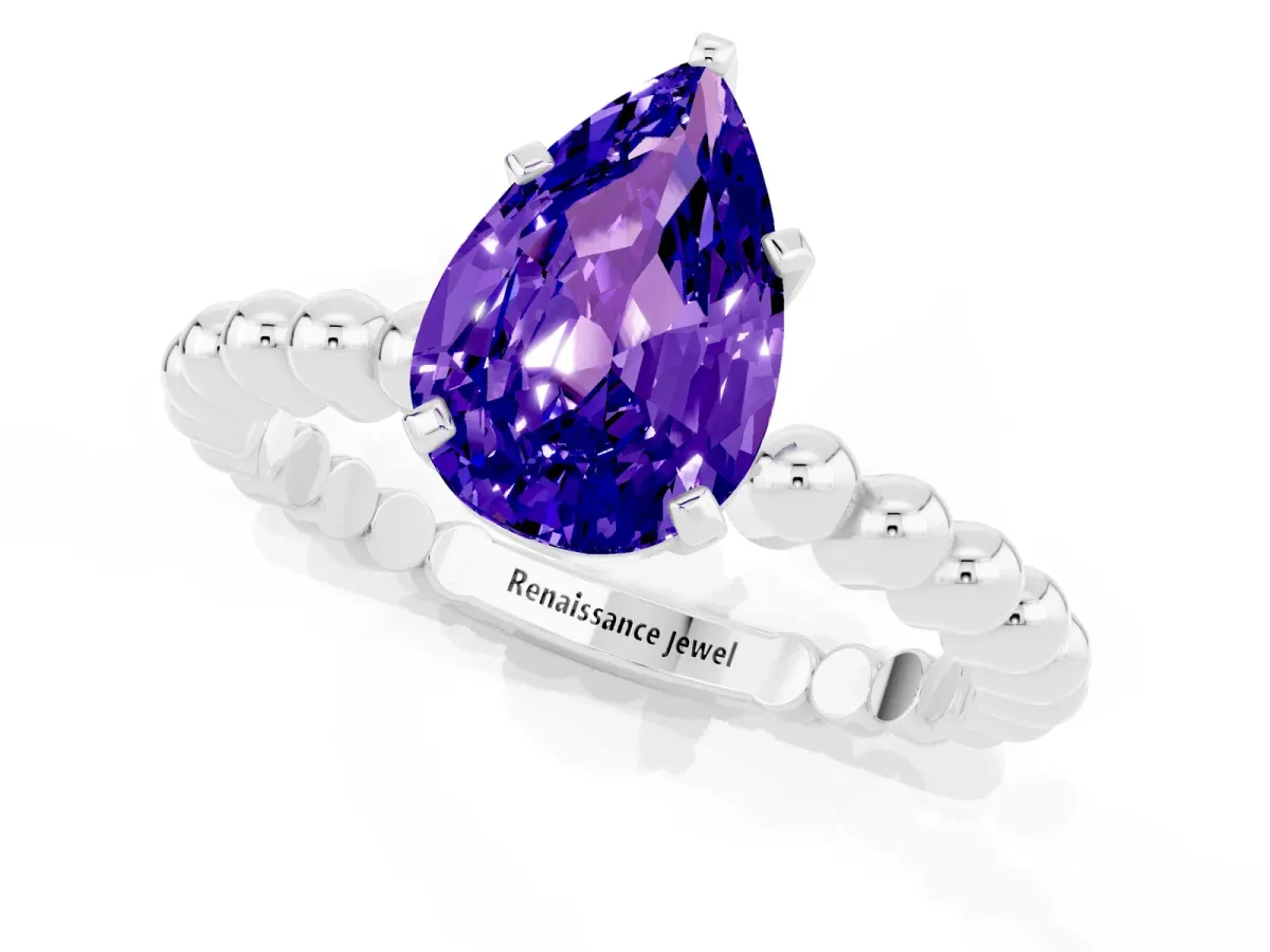 Pear Cut Tanzanite Solitaire Ring with Beaded Band and Prong Setting Silver