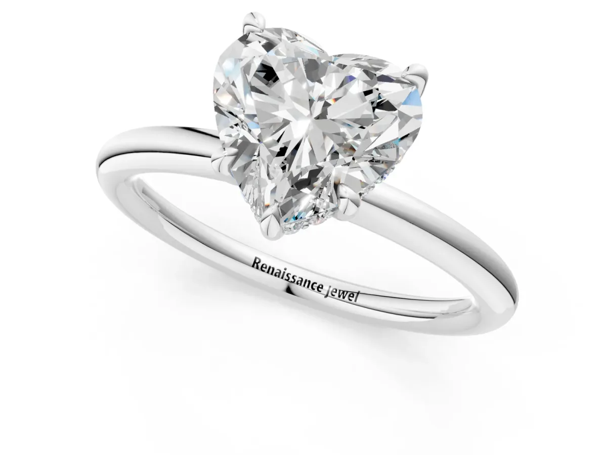 Heart Cut Diamond Solitaire Ring with Thin Band and Four-Prong Setting White gold